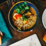 Asian seafood soup, top view. Serving restaurant.