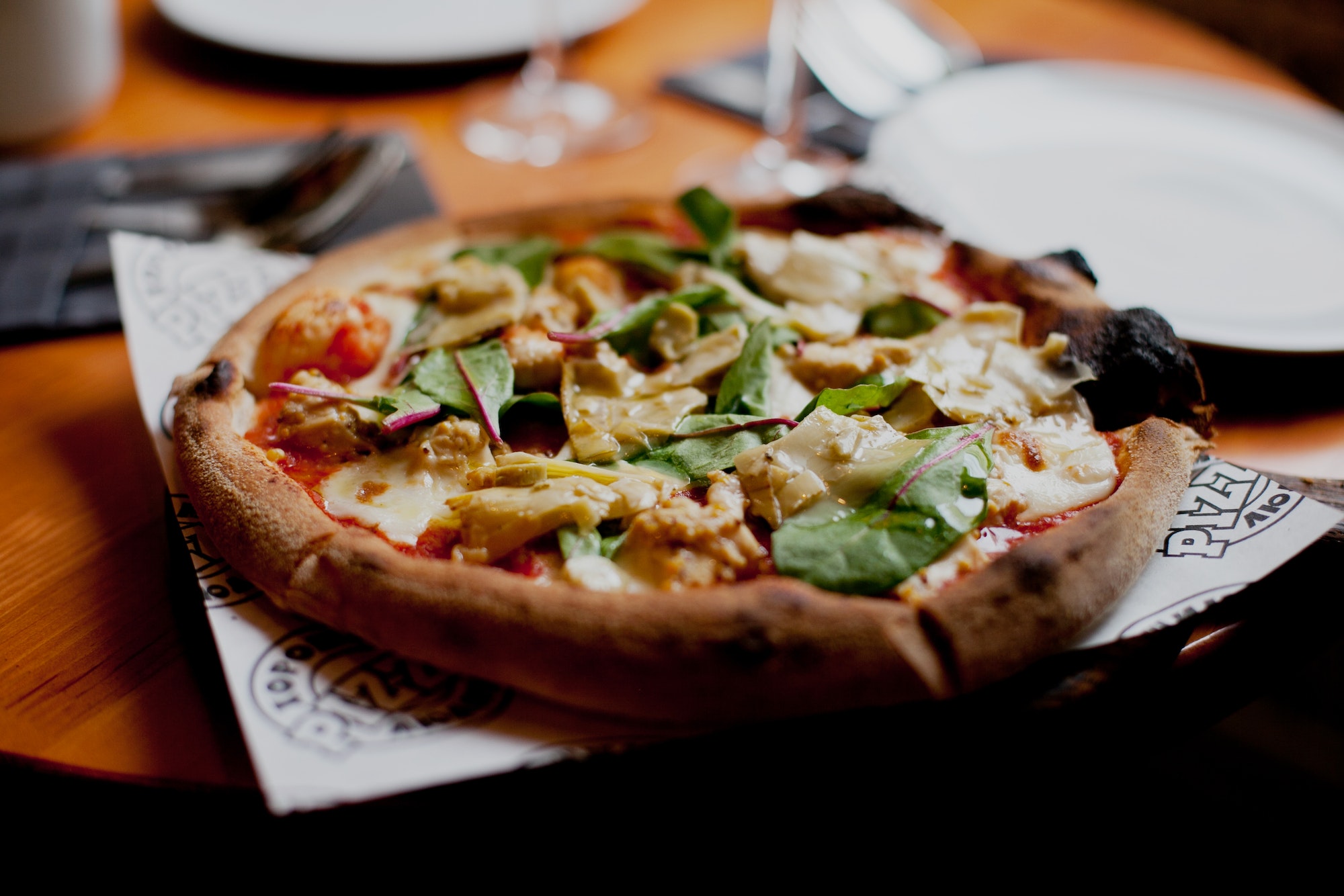 delicious yummy italian pizza at the table at the restaurant, appetizing food photo of italian pizza